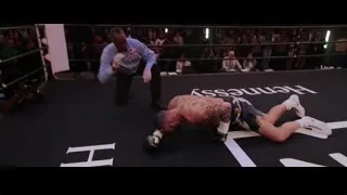 man throwing punch in boxing ring — Creed 3