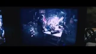 two men working on project at table — Iron Man