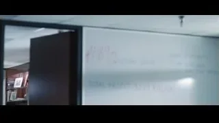 Whiteboard displaying statistics in office — The Big Short