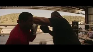 two men sparring in boxing ring — Creed 3