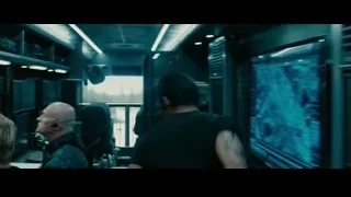 two men in control room with monitors — Furious Seven