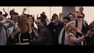 group of men cheering and shouting — The Wolf Of Wall Street