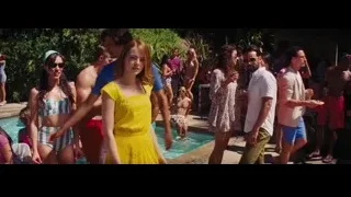 Group of people at swimming pool — La La Land