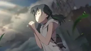 Young girl with hands in prayer under cloudy sky — Weathering with You