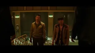 two men standing on dimly lit staircase — Bruce Lee: Birth of The Dragon