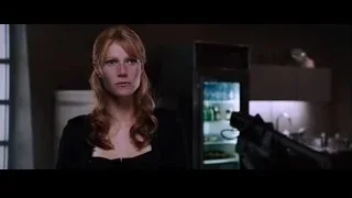Young woman standing in kitchen — Iron Man