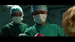 surgeons in operating room with meat — Lucy
