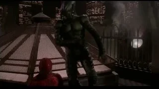 Spider-Man standing in front of statue — Spider Man