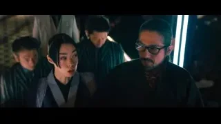 Man and woman in kimonos looking at tablet — John Wick: Chapter 4