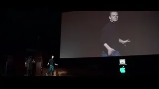 man giving presentation on stage — Steve Jobs