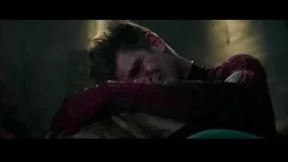 Miles Morales in Spiderman suit hugging woman — The Amazing Spider Man 2