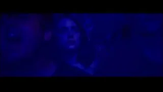 group of people in dark blue room — La La Land