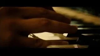 close-up of hand playing piano keys — Whiplash