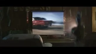 projector screen displaying a blue planet — Cars 3