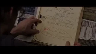 hand writing mathematical equation on paper — The Amazing Spider Man