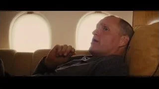 man sleeping on airplane couch — Now You See Me