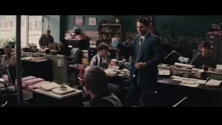 man in office giving speech — The Wolf Of Wall Street