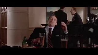 men sitting at restaurant table — American Psycho