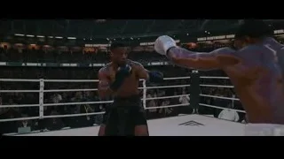 two boxers fighting in ring — Creed 3