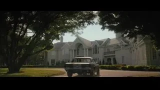 luxurious mansion with driveway and trees — Creed 2