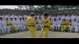 man in yellow uniform in martial arts class — Bruce Lee: Enter The Dragon