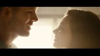 man and woman looking at each other — Deadpool 2