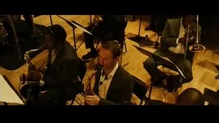 group of musicians playing instruments in concert hall — Whiplash