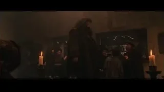 Man with beard speaking to group with candles — Harry Potter and the Philosophers Stone