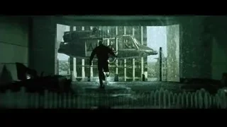 Man walking past submerged airplane — The Matrix
