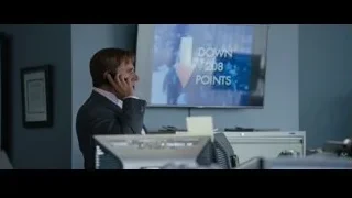 Man in suit talking on phone in office — The Big Short