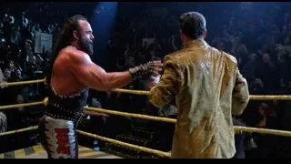 man singing with microphone in wrestling ring — Spider Man