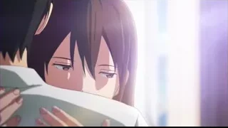 couple embracing tightly indoors — I Want To Eat Your Pancreas