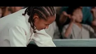 Young girl with braided hair deep in thought — The Karate Kid