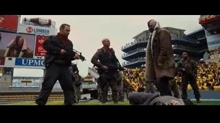 Men in military uniforms on football field — Batman: The Dark Knight Rises