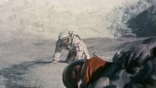 astronaut kneeling on glacier — Interstellar