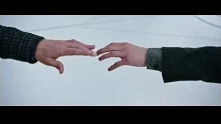 man and woman's hands reaching out — Now You See Me 2