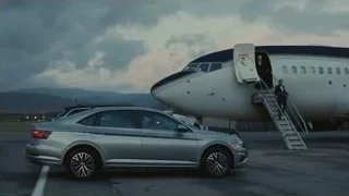 men and car walking towards airplane on tarmac — Succession