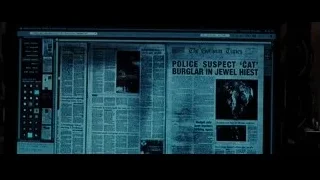 computer screen displaying Gotham Times article — Batman: The Dark Knight Rises