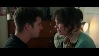 Man and woman in conversation in room — The Amazing Spider Man 2