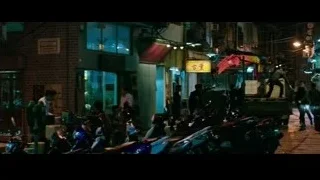 busy street at night with motorcycles — Now You See Me 2