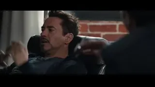 man with beard head in hands deep in thought — Iron Man 3