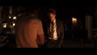 two men standing in garden at night — Jobs