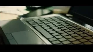 Person typing on laptop keyboard — Whiplash