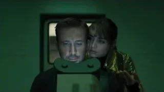 man and woman in dimly lit room — Blade Runner 2049