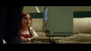 Man and woman on couch with computer monitor — Steve Jobs