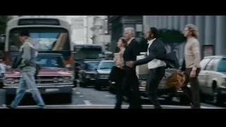 man in suit running with briefcase — The Persuit of Happyness