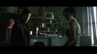 man in suit talking on phone to woman — The Matrix
