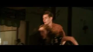 Man embracing woman in dimly lit room — Hacksaw Ridge