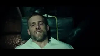 Man lying on hospital bed — Deadpool