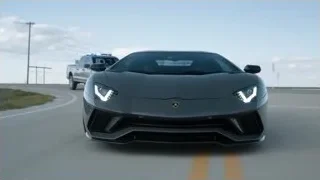 black Lamborghini Huracan with police car — Sports Cars